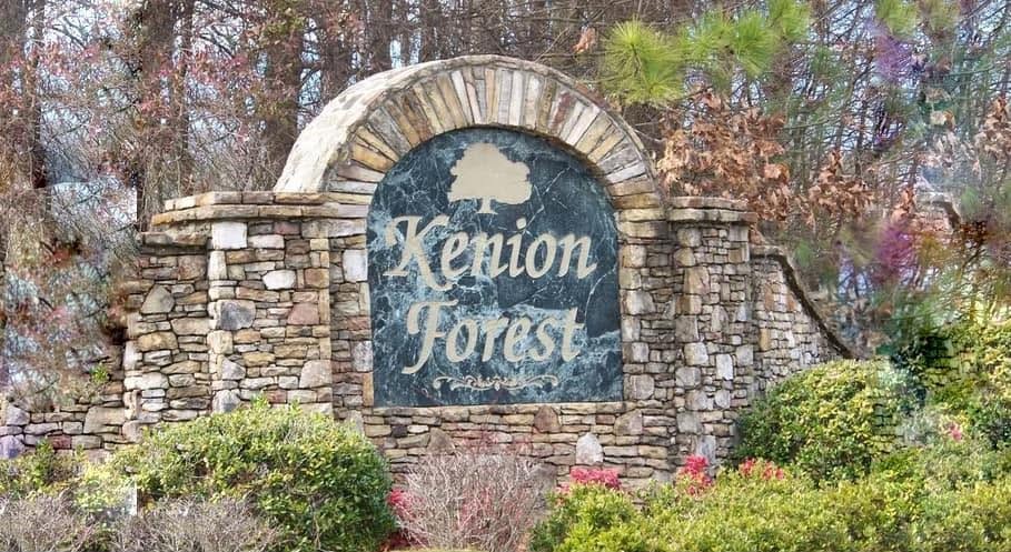 Kenion Forest entrance sign set in a stone arch